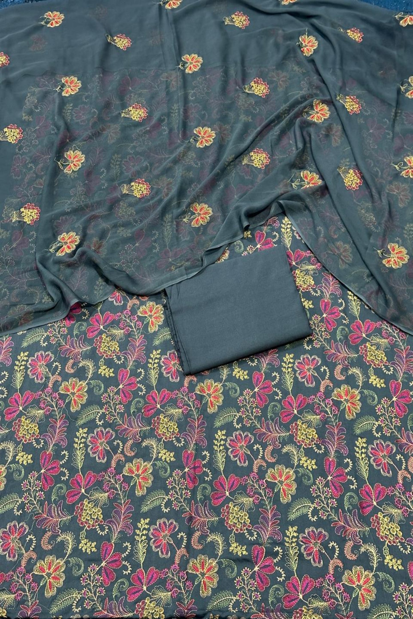 Floral patterned fabric with a dark background