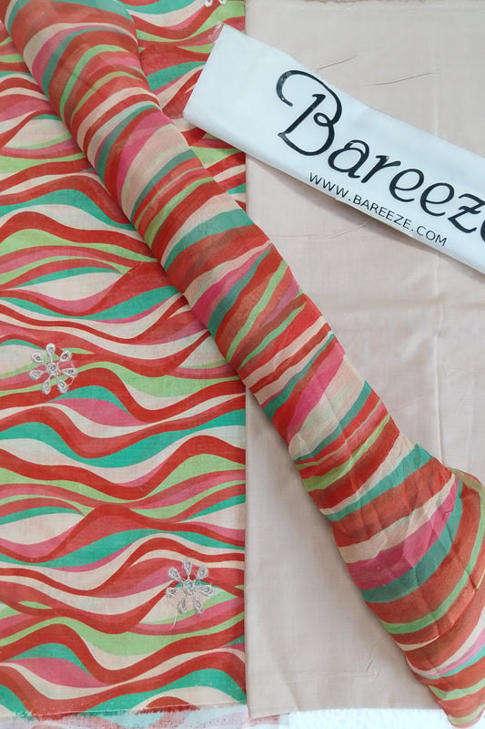 Colorful fabric with wavy pattern and Bareeze branding on a white background