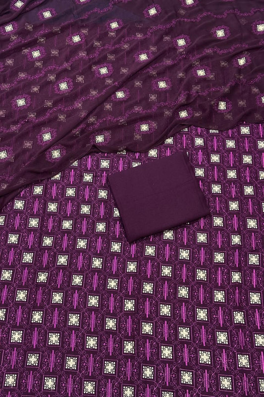 Purple fabric with a diamond pattern and a matching box on top