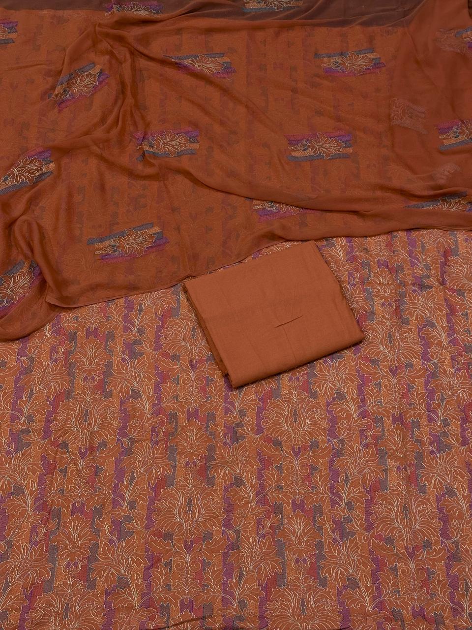 Brown fabric with intricate patterns on a matching brown background