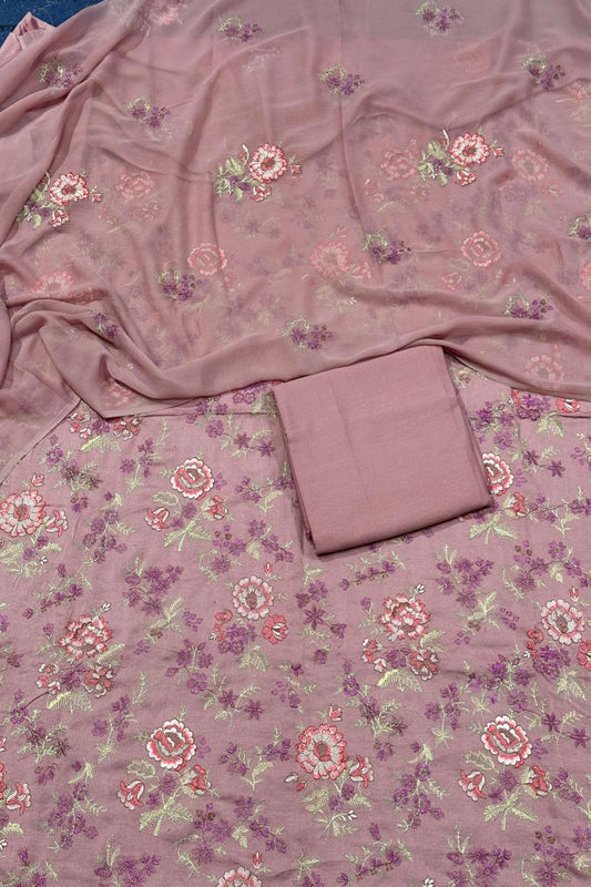 Floral patterned fabric with a folded piece of fabric on top