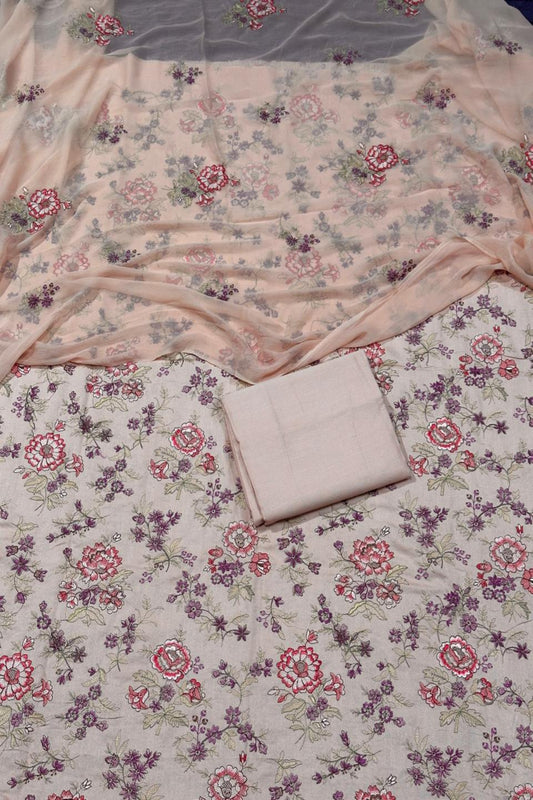 Floral-patterned fabric with a folded piece of paper on top
