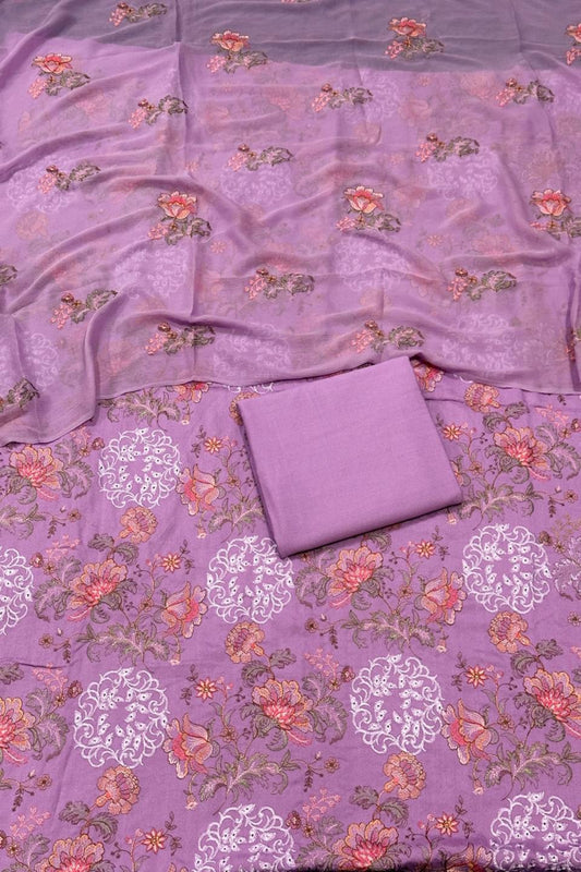 Purple fabric with floral patterns on a matching background