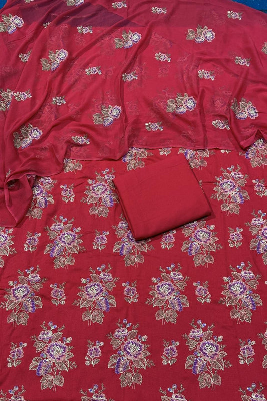 Red fabric with floral patterns on a blue background