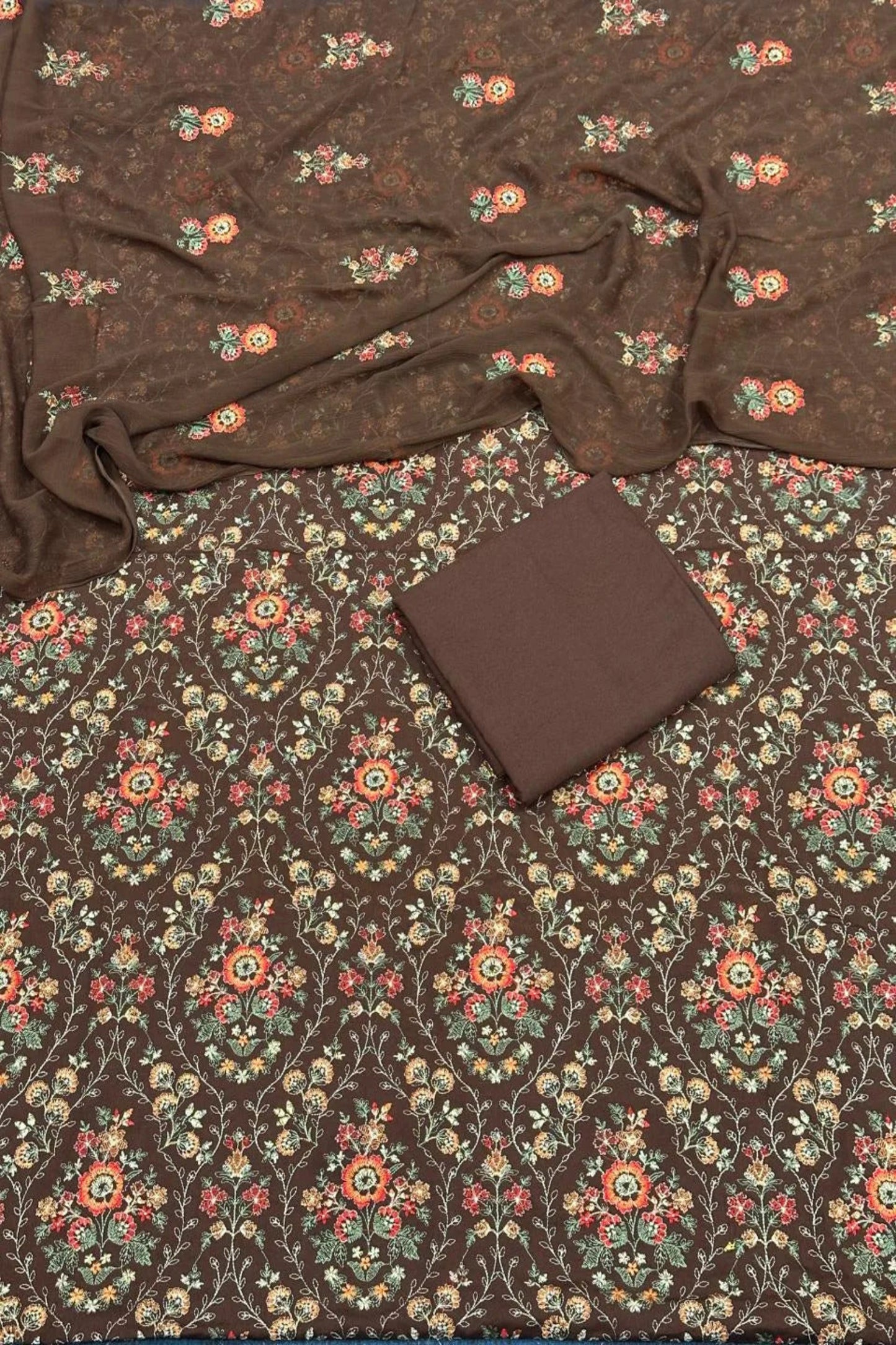 Brown fabric with floral pattern on a matching brown background