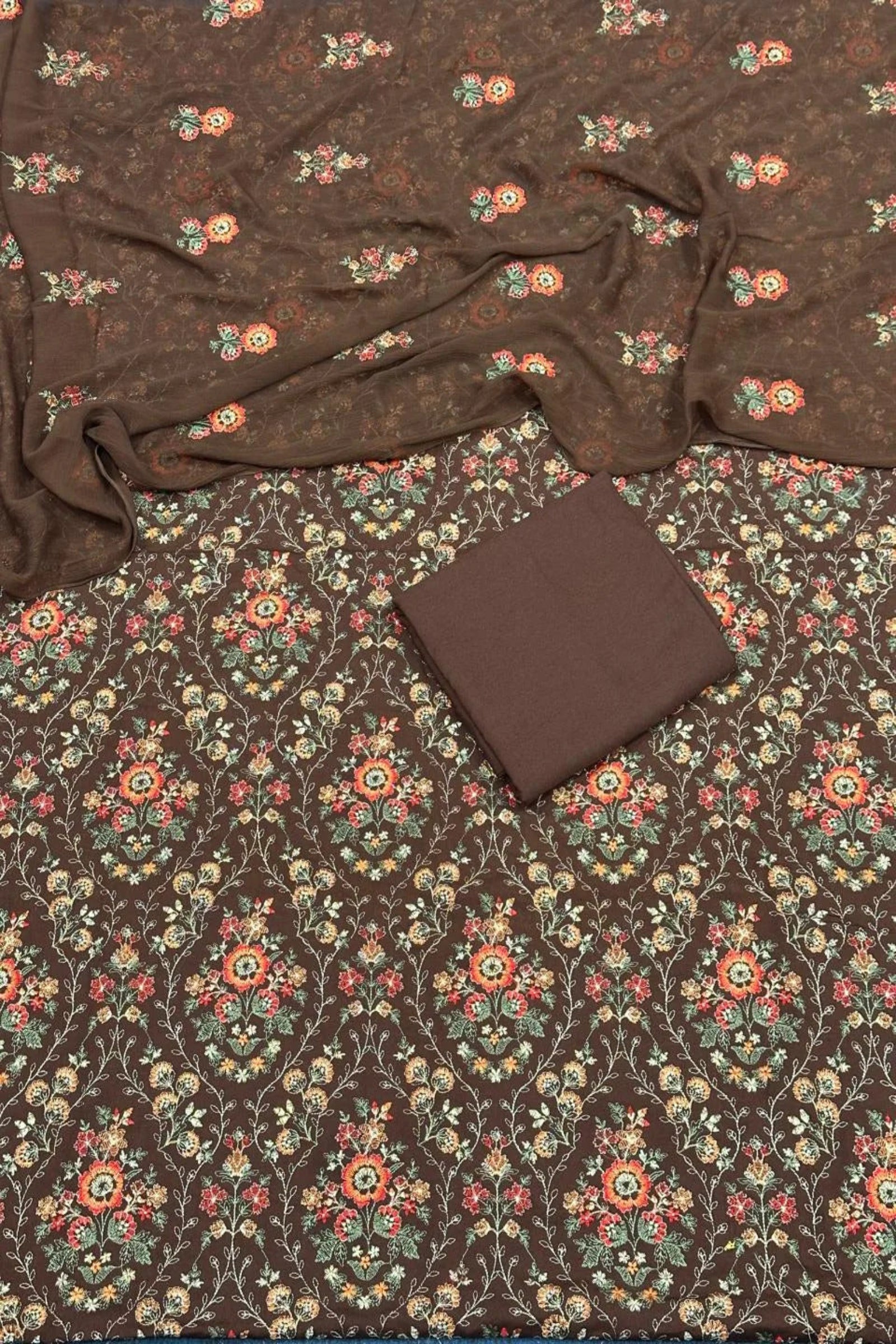 Brown fabric with floral pattern on a matching brown background