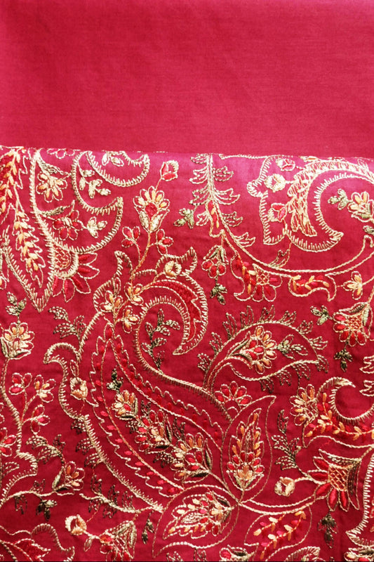 Red fabric with gold paisley pattern