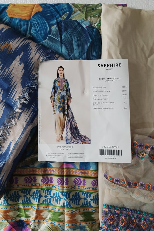 Sapphire dress label on a fabric background with colorful patterns
