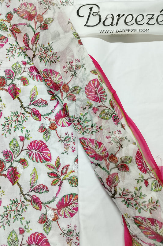 Floral fabric with pink and green patterns on a white background, featuring the Bareeze brand.