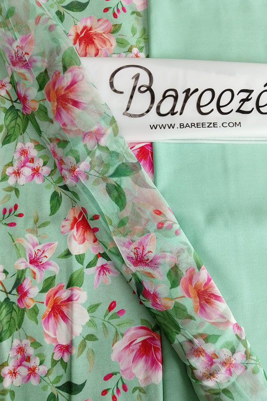 Floral fabric with 'Bareeezé' branding on a green background