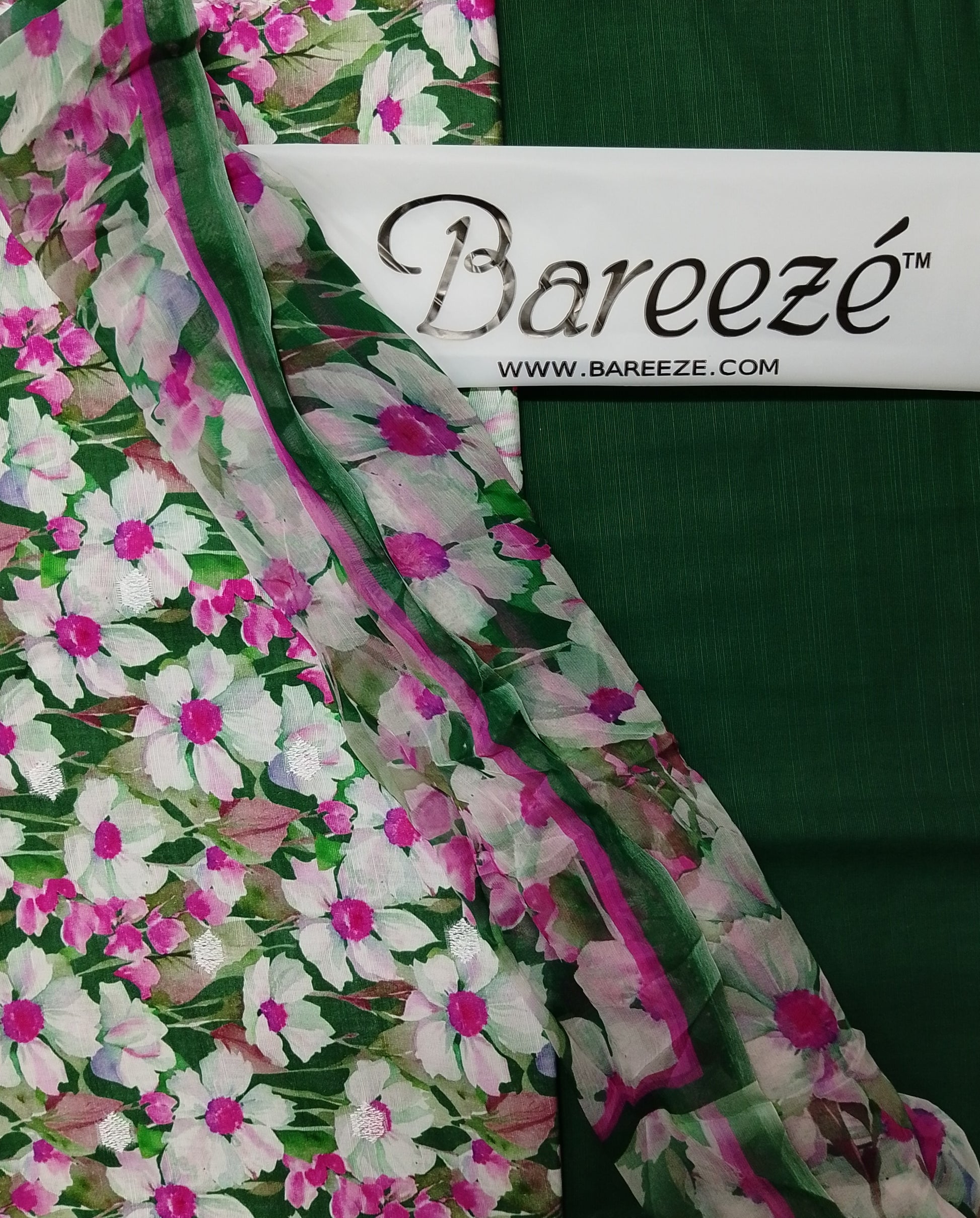 Floral fabric with Bareezé label on a green background