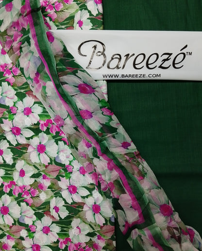 Floral fabric with Bareezé label on a green background