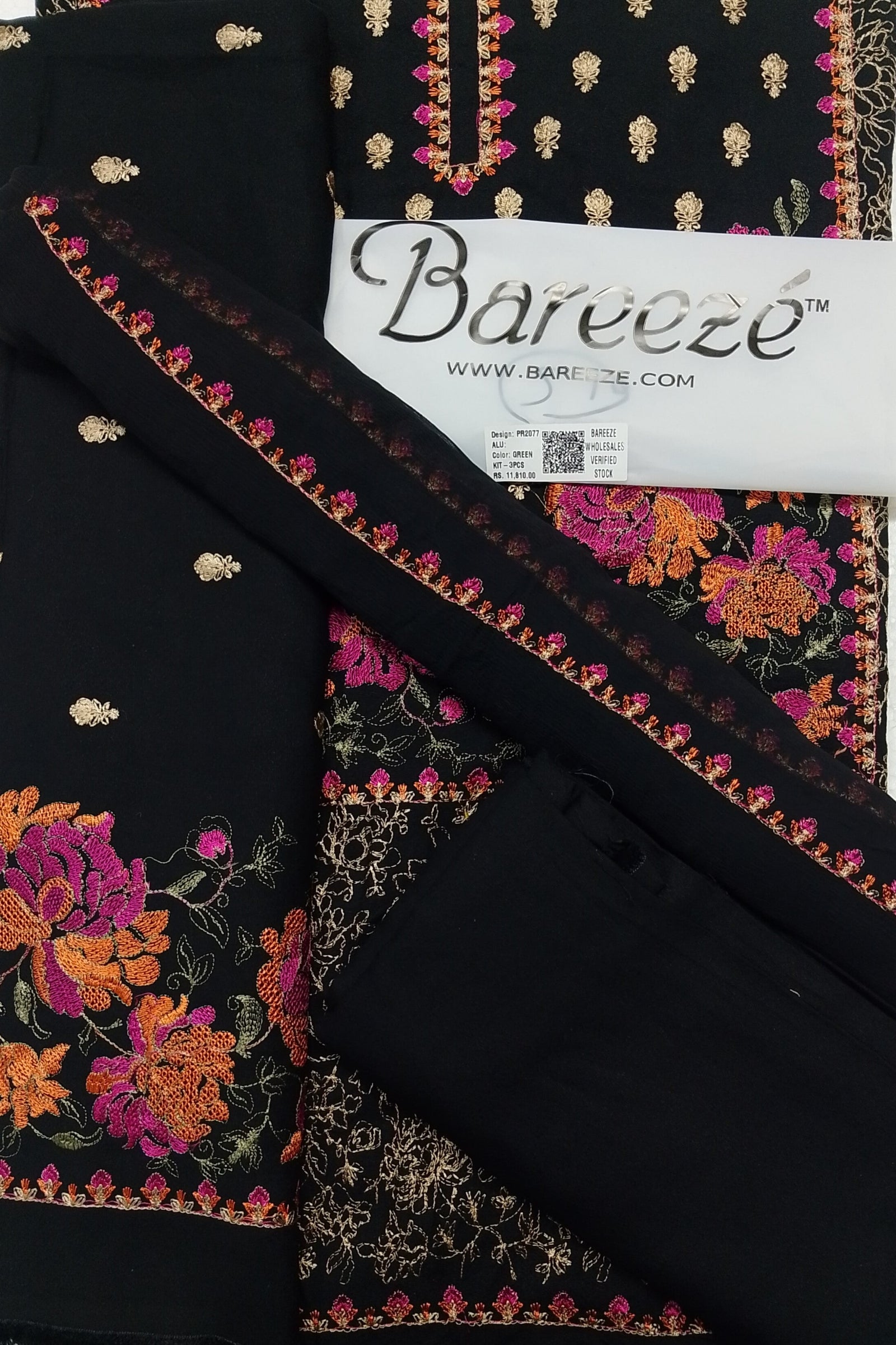 Black fabric with colorful floral embroidery and Bareeze label