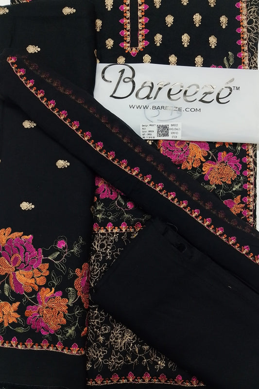Black fabric with colorful floral embroidery and Bareeze label