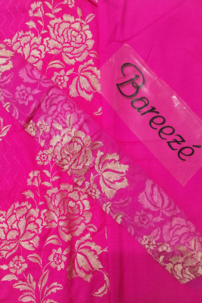 Pink fabric with gold floral patterns and a 'Bareeeze' label.