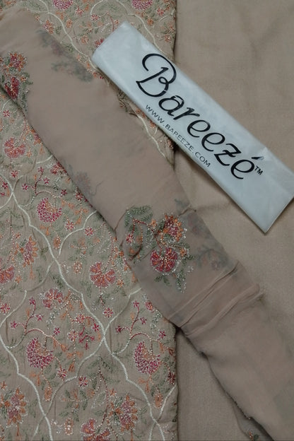 Beige fabric with floral patterns and Bareeze label