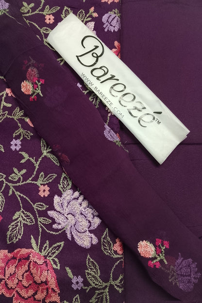Embroidered fabric with floral patterns and a Bareoeze label.