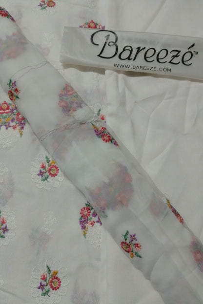 Floral embroidered fabric with Bareezé label