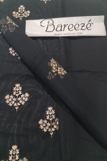 Black fabric with gold floral patterns and Bareezé branding label.