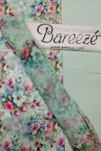 Floral fabric with sequins on a white background, featuring the brand 'Bareeze'.